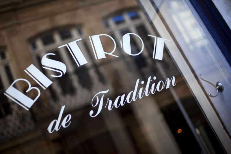 54672092 - close up of the window of a french bistro