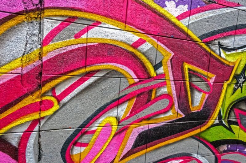 17899770 - abstract drawing graffiti on a street wall